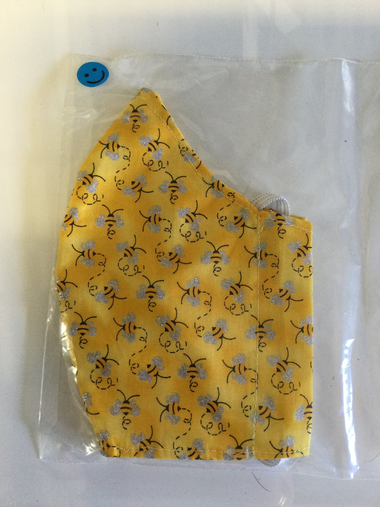 Glittery bees on yellow design