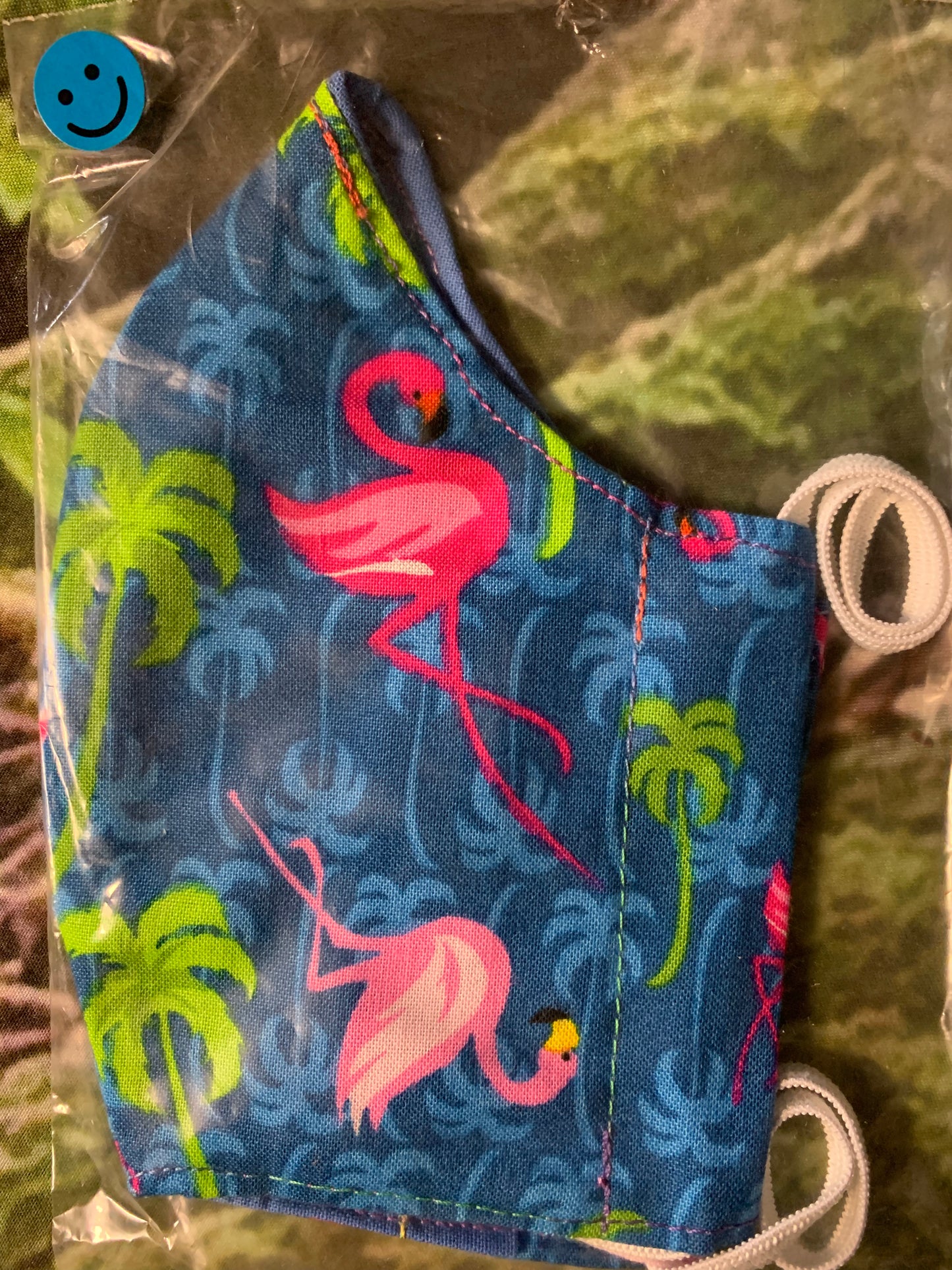 Flamingos on blue